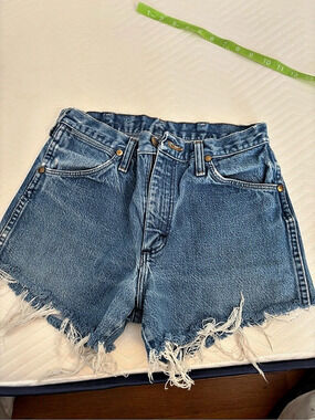 Wrangler High-Rise Denim Cutoff Shorts Distressed Denim Jean Shorts in Blue